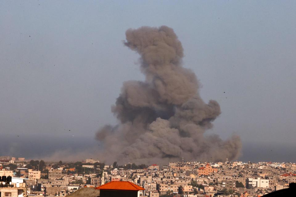 Smoke billows after an Israeli strike on Rafah, in the southern Gaza Strip on 23 November 2023 (AFP via Getty Images)