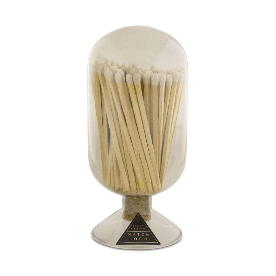 <h2>Skeem Designs Glass Match Cloche Bottle</h2><br>If you’ve gifted way too many candles over the years or are looking to supplement a candle gift, these oversized matches, that come cased in a cloche, double as a decor piece. <br><br><strong>Skeem Designs</strong> Skeem Design Glass Match Cloche Bottle, $, available at <a href="https://amzn.to/305Q01r" rel="nofollow noopener" target="_blank" data-ylk="slk:Amazon" class="link rapid-noclick-resp">Amazon</a>