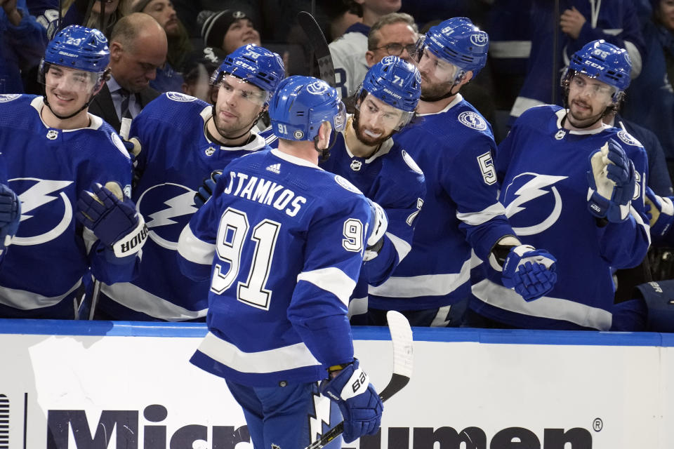 Tampa Bay Lightning center Steven Stamkos (91) celebrates with the bench after scoring against the Anaheim Ducks during the second period of an NHL hockey game Saturday, Jan. 13, 2024, in Tampa, Fla. (AP Photo/Chris O'Meara)