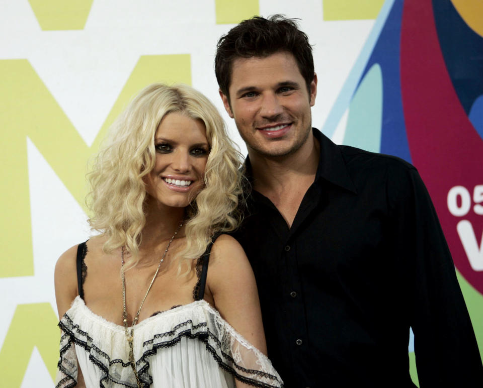 Singer Jessica Simpson and husband Nick Lachey arrive at the MTV Awards at the American Airlines Arena Sunday Aug. 28, 2005 in Miami, Fla. (AP Photo/Alan Diaz)