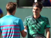 Mar 19, 2017; Indian Wells, CA, USA; Roger Federer (SUI) shakes hands with Stan Wawrinka (SUI) after he won the men's singles final 7-6, 6-4 in the BNP Paribas Open at the Indian Wells Tennis Garden. Mandatory Credit: Jayne Kamin-Oncea-USA TODAY Sports