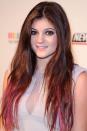 <p>Before Jenner was known for wearing wigs in every shade of the rainbow, she tried extensions with hot pink tips.</p>