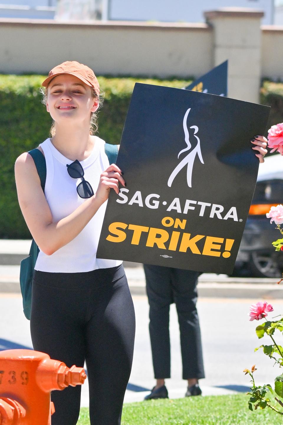 Joey King is seen participating in the SAG strike in Los Angeles Ca. After recently hitting up the Taylor Swift show and starring in her new video, Joey king is seen protesting in Los Angeles Ca outside of the Warner bro's studio. 14 Jul 2023 Pictured: Joey King. Photo credit: Snorlax / MEGA TheMegaAgency.com +1 888 505 6342 (Mega Agency TagID: MEGA1007385_001.jpg) [Photo via Mega Agency]