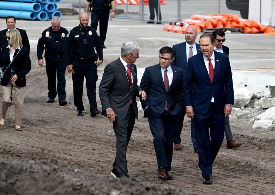 SRQ president and CEO Rick Piccolo walks with House Speaker Mike Johnson, R-La., and U.S. Congressman Vern Buchanan, R-Longboat Key, before touring the construction site for the $70 million ground-level passenger terminal at Sarasota Bradenton International Airport.