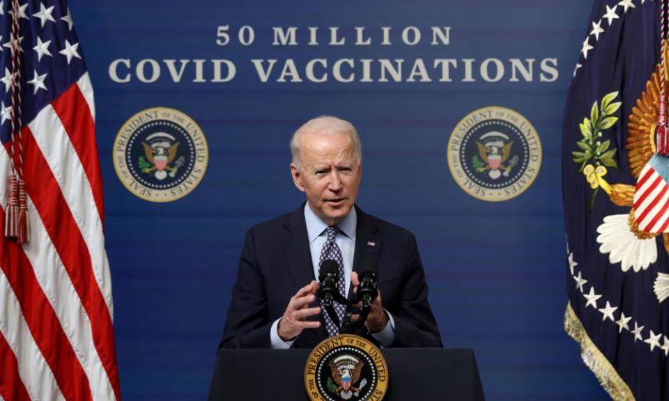 Joe Biden delivers remarks as he commemorates the 50 millionth coronavirus vaccination with a number of vaccine recipients in the South Court Auditorium at the White House in Washington, 25 February 2021.