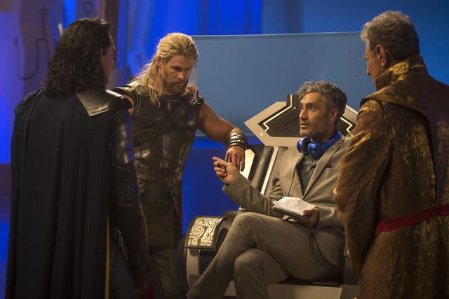 <p>Marvel/Disney/Kobal/Shutterstock</p> (L-R) Tom Hiddleston, Chris Hemsworth, Taika Waititi and Jeff Goldblum on the set of 'Thor: Ragnarok'