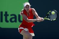 Mar 30, 2017; Miami, FL, USA; Caroline Wozniacki of Denmark hits a backhand against Karoilina Pliskova of the Czech Republic (not pictured) in a women's singles semi-final during the 2017 Miami Open at Crandon Park Tennis Center. Geoff Burke-USA TODAY Sports