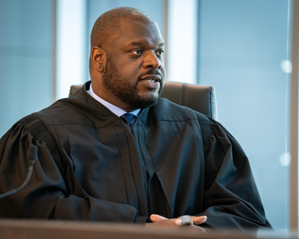 Polk County District Judge David M. Porter speaks with a witness during, a sentencing hearing for Pieper Lewis, Wednesday, Sept. 7, 2022.