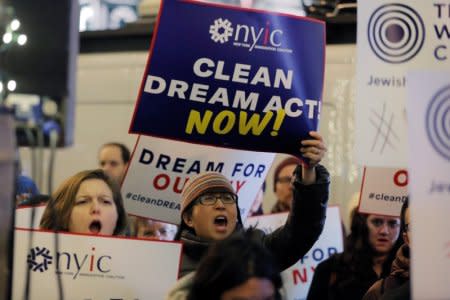 FILE PHOTO: Activists demonstrate outside the New York office of Sen. Chuck Schumer (D-NY) to ask for the passage of a 'clean' Dream Act, one without additional enforcement or security, in New York, U.S., January 10, 2018. REUTERS/Lucas Jackson