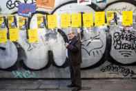 <p>A man sitting with posters in support of Catalonia politicians who have been jailed on charges of sedition in Barcelona, Spain, Dec. 21, 2017. (Photograph by Jose Colon / MeMo for Yahoo News) </p>