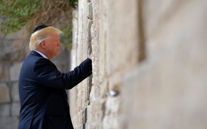 US President Donald Trump visits the Western Wall, the holiest site where Jews can pray, in Jerusalems Old City on May 22, 2017 - AFP or licensors