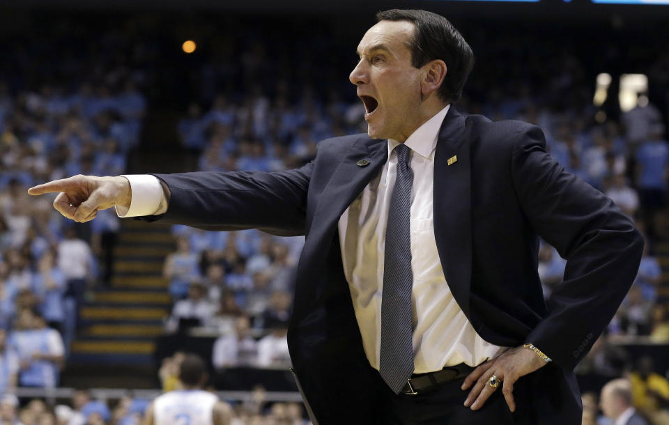 Duke coach Mike Krzyzewski points during the second half of an NCAA college basketball game against North Carolina in Chapel Hill, N.C., Thursday, Feb. 20, 2014. North Carolina won 74-66. (AP Photo/Gerry Broome)