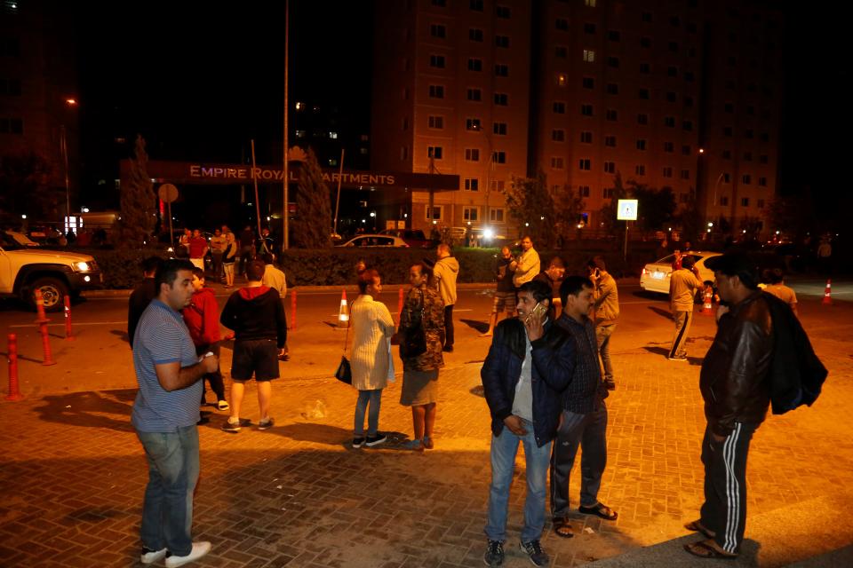 <p>People gather at street after a 7.2 magnitude earthquake hit northern Iraq in Erbil, Iraq on Nov. 12, 2017. (Photo: Yunus Keles/Anadolu Agency/Getty Images) </p>