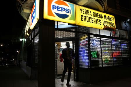 Vish Arya, 26, who is an operations analyst living at The Negev tech house, walks out of a corner store in San Francisco, California, U.S. January 29, 2017. REUTERS/Gabrielle Lurie