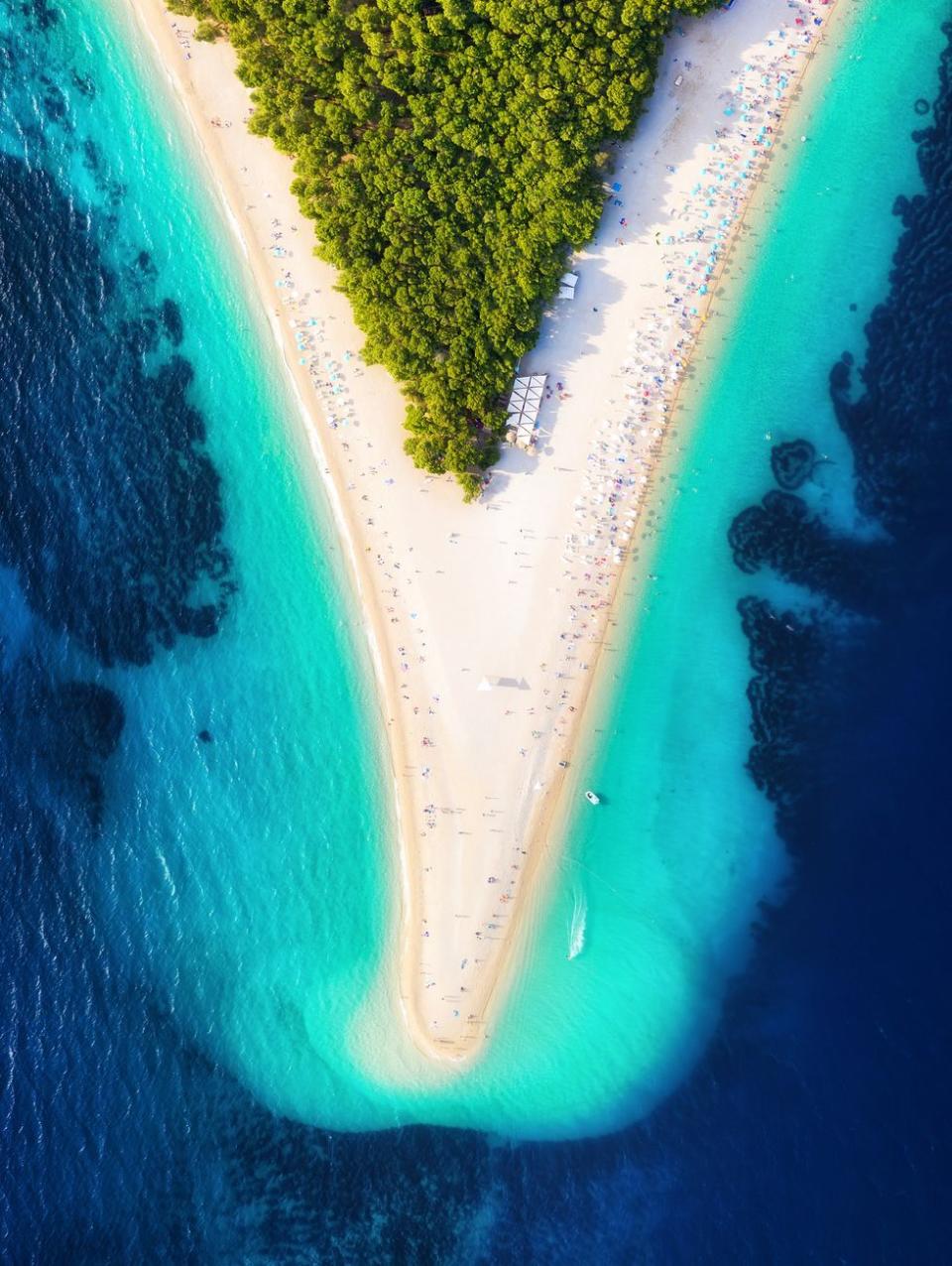 Croatia, Hvar island, Bol. Aerial view at the Zlatni Rat. Beach and sea from air. Famous place in Croatia. Summer seascape from drone. Travel - image