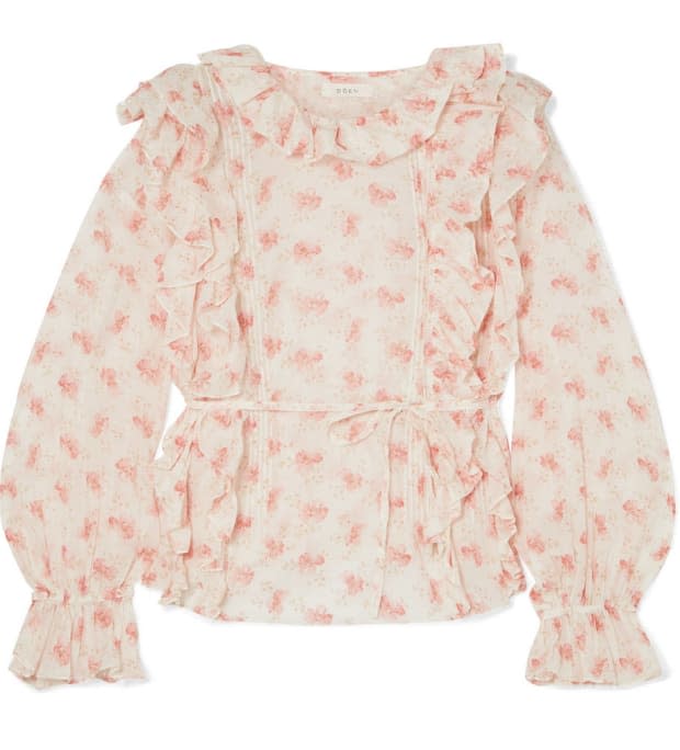 <p>Doên Luca Ruffled Floral-Print Cotton-Voile Blouse, $168, <a href="https://rstyle.me/+brD_I7y0ISSPd7iEZ8ggbg" rel="nofollow noopener" target="_blank" data-ylk="slk:availble here;elm:context_link;itc:0;sec:content-canvas" class="link ">availble here</a>. </p>