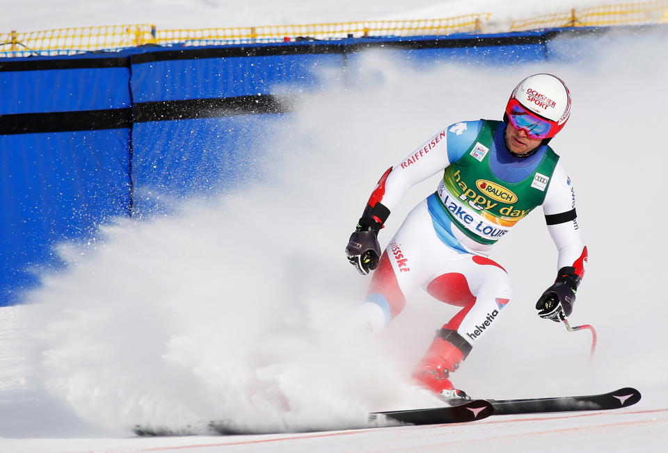 Mauro Caviezel, of Switzerland, reacts in the finish area at the men's World Cup super-G ski race at Lake Louise, Alberta, Sunday, Nov. 25, 2018. (Jeff McIntosh/The Canadian Press via AP)