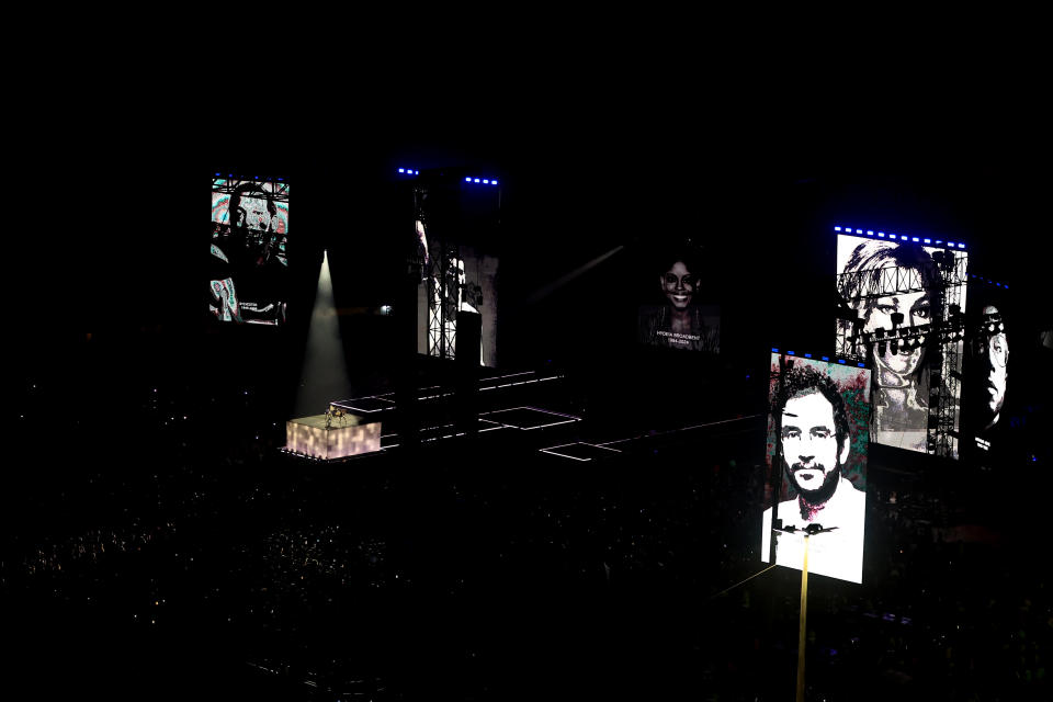 RIO DE JANEIRO, BRAZIL - MAY 04: American singer Madonna performs the song "Live to Tell" while giant screens show pictures of people who died as a result of AIDS during her massive free show to close "The Celebration Tour" at Copacabana Beach on May 04, 2024 in Rio de Janeiro, Brazil. (Photo by Buda Mendes/Getty Images)