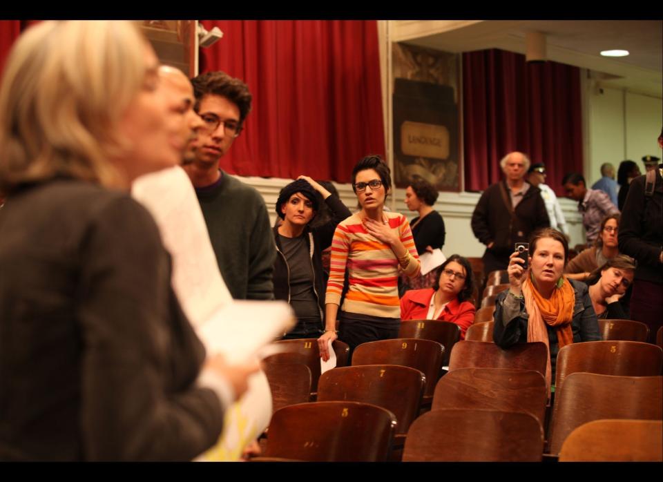 A member of Occupy Wall Street listens to a speaker at Seward High School, New York on Tuesday, October 26, 2011. (Myra Iqbal, AOL)