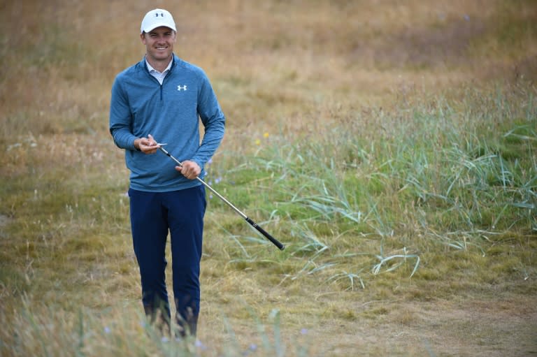 Defending Open champion all smiles at Carnoustie on Monday ahead of the defence of his title