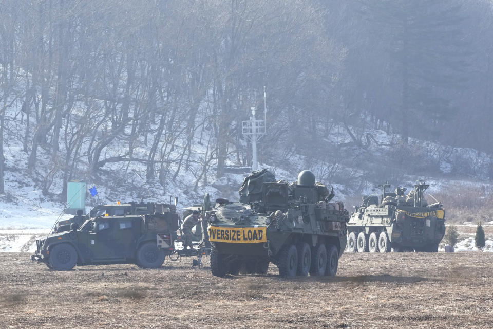 U.S. military armored vehicles park in Paju, South Korea, near the border with North Korea, Wednesday, Jan. 11, 2023. North Korea's spike in missile tests, growing nuclear ambitions and other provocative acts pose a "serious threat" that could lead to a dangerous miscalculation and spark a wider conflict, South Korean President Yoon Suk Yeol said Tuesday. (AP Photo/Ahn Young-joon)