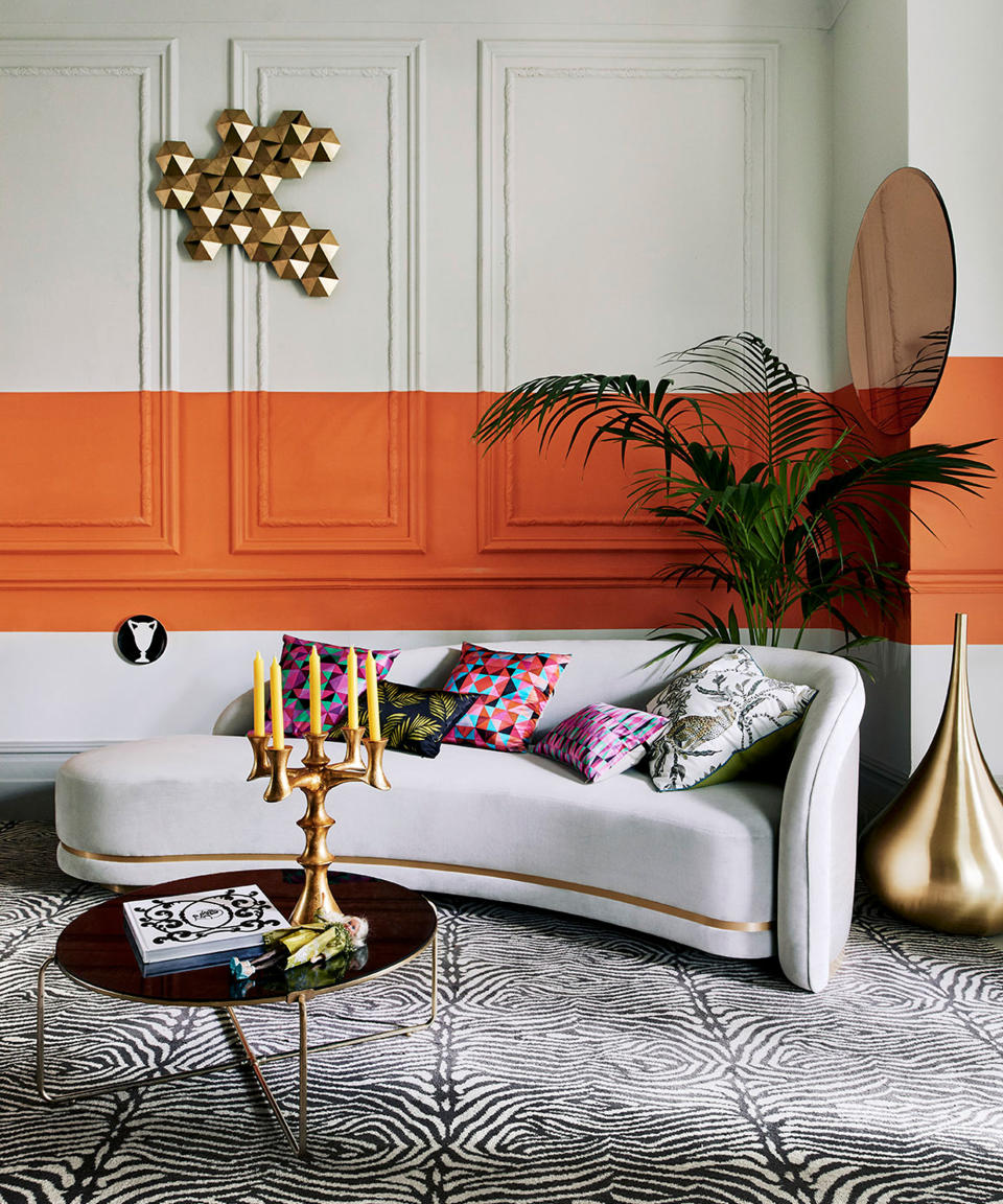 <p> Whether you have a traditional living room that features original paneling or simply want to add a tactile, textural element to the walls in a more modern space, there is something incredibly sophisticated and elegant about paneling.&#xA0; </p> <p> Helen Shaw, director at Benjamin Moore says, &apos;an inexpensive way to make a space feel luxurious, wall paneling is a great way to add texture and depth in a room. </p> <p> Picking the right color to decorate with is key; if you prefer a subtle and elegant aesthetic, consider a tonal scheme by matching the wall color with the panel d&#xE9;cor, or for a more impactful finish, pick out a complimentary or feature color to draw the eye.&apos; </p> <p> Painting a Panel can really make an eye-catching feature out of your wall paneling and transform it from the simple to the sublime. As shown in the colorful living room above, the wall paneling and bold painted design unite together as one to establish a unique design that embodies an eclectic mix of the old and the new. </p>