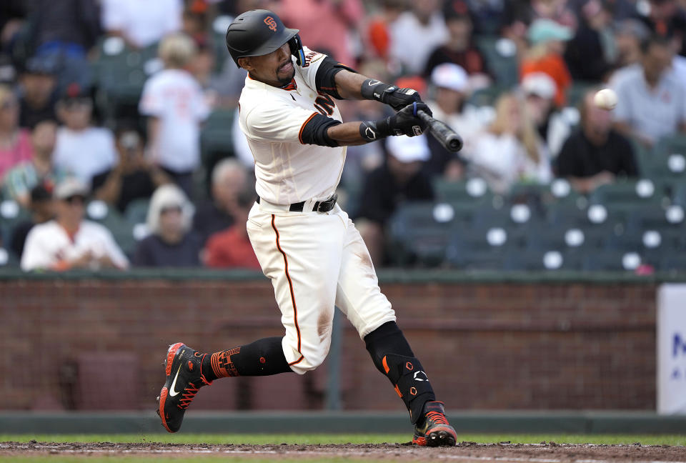 SAN FRANCISCO, CALIFORNIA - JULY 31: Dixon Machado #49 of the San Francisco Giants hits a single against the Chicago Cubs in the bottom of the seventh inning at Oracle Park on July 31, 2022 in San Francisco, California. (Photo by Thearon W. Henderson/Getty Images)