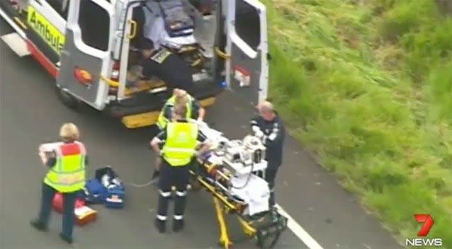 Victims of the crash being taken away for medical treatment. Source: 7 News.