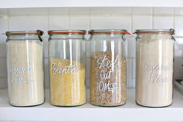 <a href="http://abeautifulmess.com/2015/12/try-this-paint-pen-kitchen-organization.html" data-component="link" data-source="inlineLink" data-type="externalLink" data-ordinal="1">A Beautiful Mess</a>