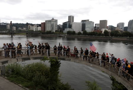 Proud Boys and their supporters march to rally in Portland, Oregon