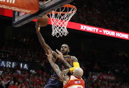 May 22, 2015; Atlanta, GA, USA; Cleveland Cavaliers forward LeBron James (23) shoots against Atlanta Hawks forward Pero Antic (6) during the first quarter in game two of the Eastern Conference Finals of the NBA Playoffs at Philips Arena. Brett Davis-USA TODAY Sports