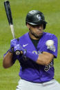 Colorado Rockies' Elias Diaz gets out of the way of a high, inside fastball from Pittsburgh Pirates relief pitcher David Bednar during the ninth inning of a baseball game in Pittsburgh, Monday, May 23, 2022. (AP Photo/Gene J. Puskar)