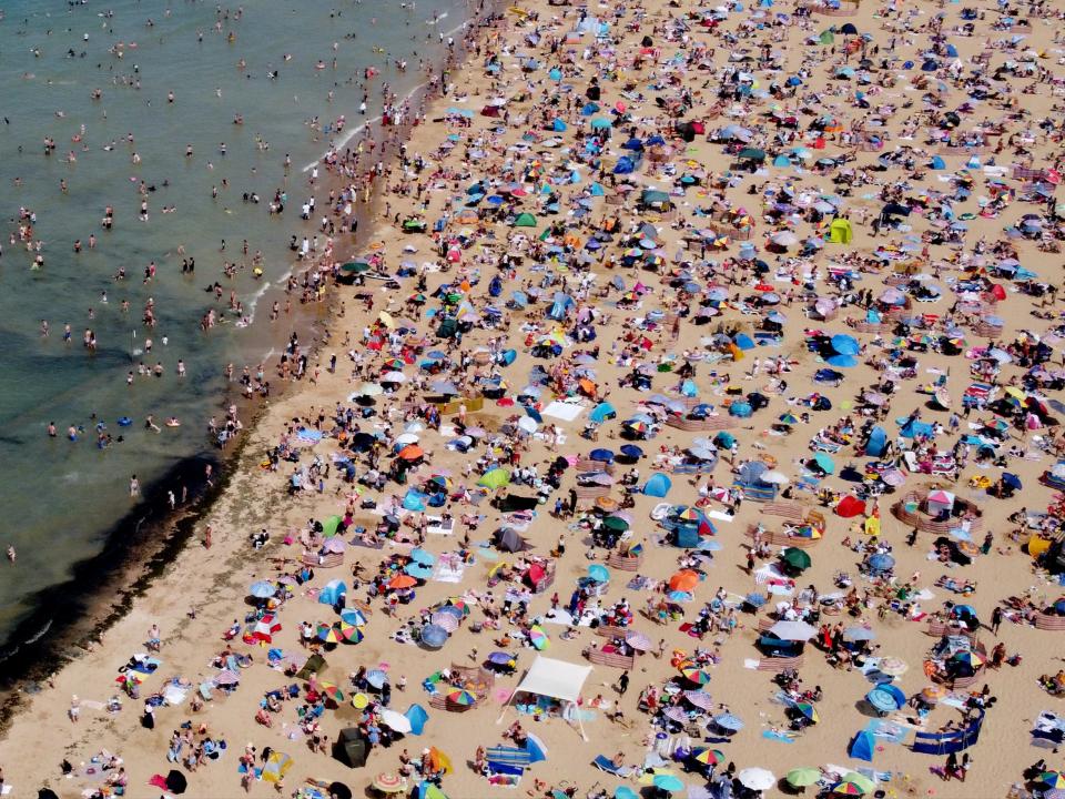 A bird’s eye view of people on the beach in Margate, Kent (PA)