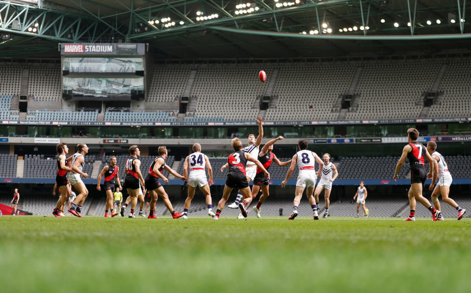 MELBOURNE, AUSTRALIA - MARCH 21: A general view as empty seats are seen due to the coronavirus outbreak during the 2020 AFL Round 01 match between the Essendon Bombers and the Fremantle Dockers at Marvel Stadium on March 21, 2020 in Melbourne, Australia. (Photo by Michael Willson/AFL Photos via Getty Images)