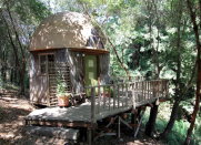 <body> <p>The geodesic dome atop this California cabin makes the lodging look almost like an ornate birdhouse, which could be what earned it the name "Hummingbird Haven." Beneath the dome lie a spacious loft and bath, and a <a rel="nofollow noopener" href=" http://www.bobvila.com/slideshow/11-inspiring-kitchens-that-defy-their-small-size-47280?bv=yahoo" target="_blank" data-ylk="slk:kitchenette;elm:context_link;itc:0;sec:content-canvas" class="link ">kitchenette</a> filled with modern amenities. The scenic deck is surrounded by 10 acres of lush forest rife with hummingbirds and other wildlife.</p> <p><strong>Related: <a rel="nofollow noopener" href=" http://www.bobvila.com/slideshow/7-creative-guest-houses-you-can-actually-afford-48634?#.WD-oVaIrKRs?bv=yahoo" target="_blank" data-ylk="slk:7 Creative Guest Houses You Can Actually Afford;elm:context_link;itc:0;sec:content-canvas" class="link ">7 Creative Guest Houses You Can Actually Afford</a> </strong> </p> </body>