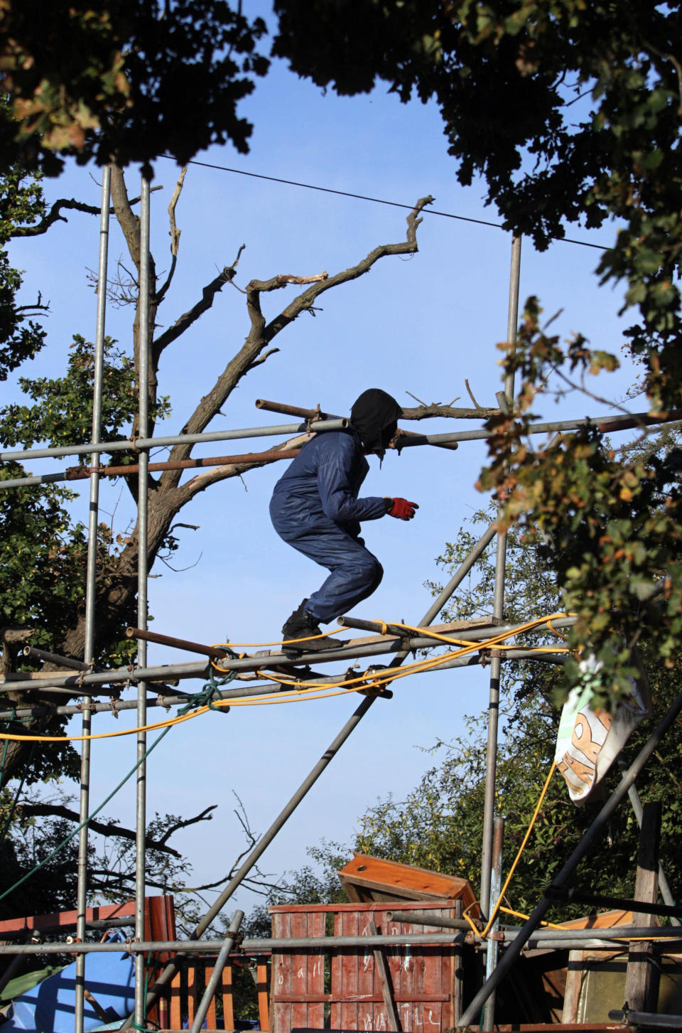 A protester at the Dale Farm travellers site at Cray's Hill, near Basildon, Essex, where bailiffs prepare to forcibly eject the residents.