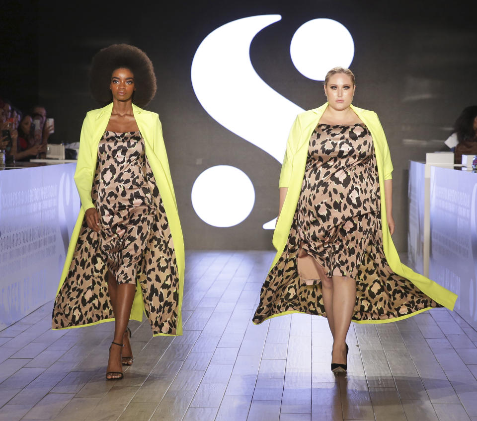 Modesl wear clothes by Serena Williams during Fashion Week in New York, Tuesday, Sept. 10, 2019. (AP Photo/Seth Wenig)