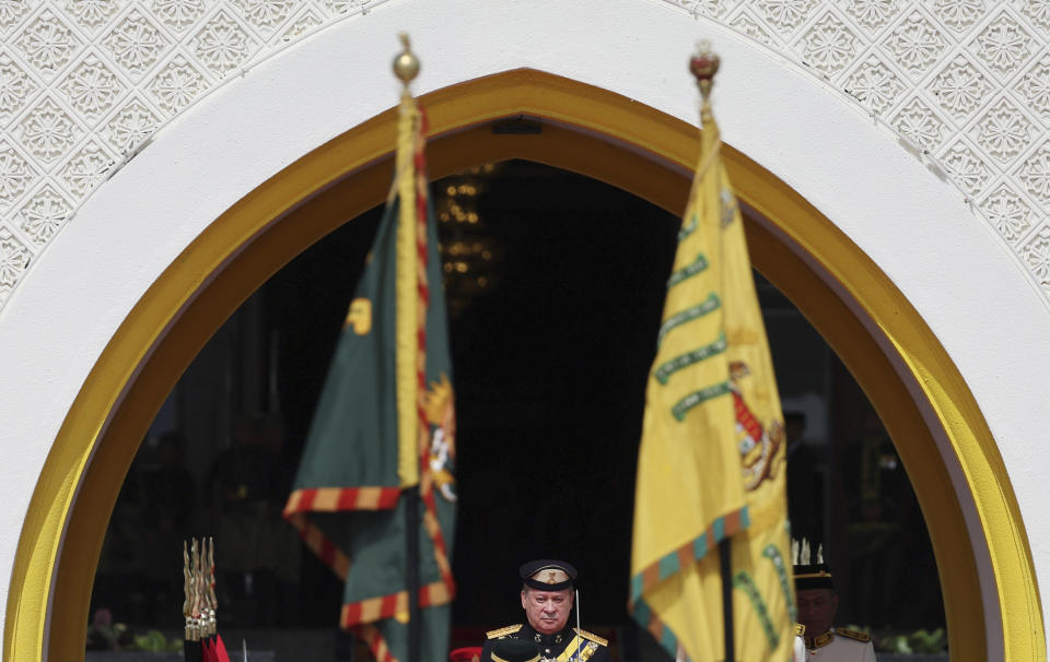 Sultan Ibrahim Sultan Iskandar observes the guard of honor at National Palace in Kuala Lumpur, Malaysia Wednesday, Jan. 31, 2024. The billionaire sultan who rules Malaysia’s Johor state was sworn in as the nation’s new king Wednesday under a unique rotating monarchy system. (Hasnoor Hussain/Pool Photo via AP)