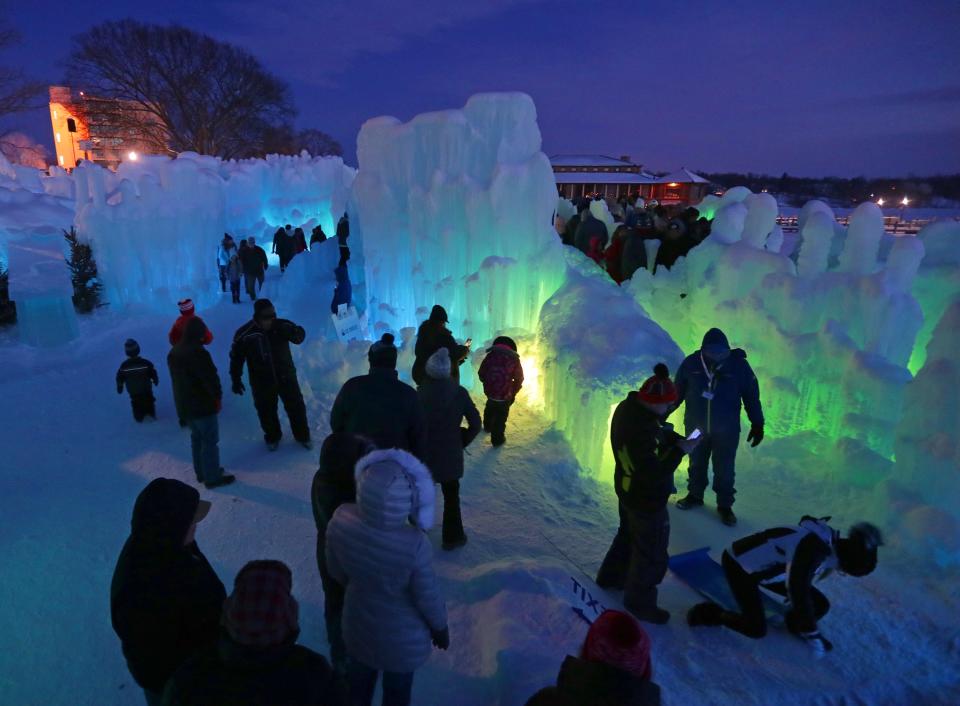 LED lights illuminate the ice formations at the Ice Castles display in Lake Geneva in January 2019.