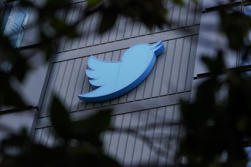 A sign is pictured outside the Twitter headquarters in San Francisco, Wednesday, Oct. 26, 2022. A court has given Elon Musk until Friday to close his April agreement to acquire the company after he earlier tried to back out of the deal. (AP Photo/Godofredo A. Vásquez)