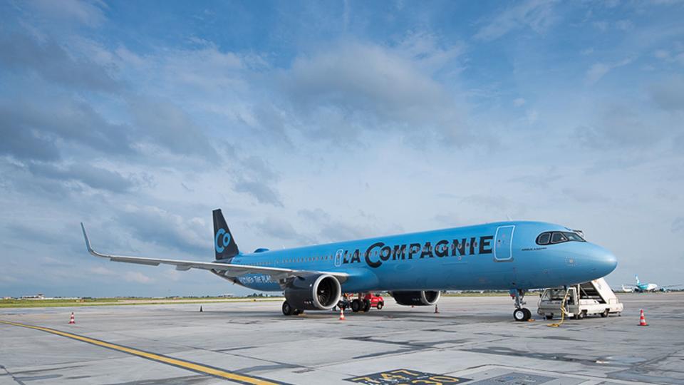 Exterior of a La Compagnie aircraft on a tarmac