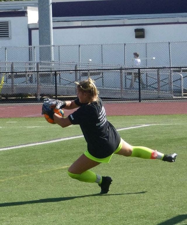 Pleasant Valley goalkeeper Samantha Merklin makes a save against East Stroudsburg South.