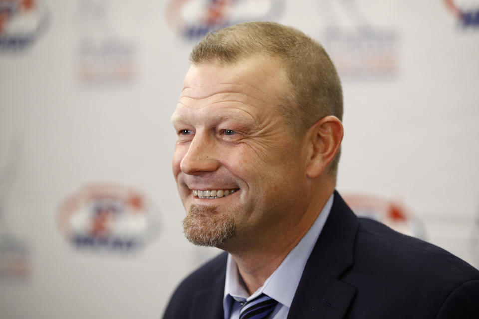 Former Boston Bruins goalie Tim Thomas speaks with members of the media before being inducted into the U.S. Hockey Hall of Fame, Thursday, Dec. 12, 2019, in Washington. (AP Photo/Patrick Semansky)