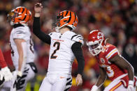 Cincinnati Bengals place kicker Evan McPherson (2) watches his field goal against the Kansas City Chiefs during the first half of the NFL AFC Championship playoff football game, Sunday, Jan. 29, 2023, in Kansas City, Mo. (AP Photo/Charlie Riedel)