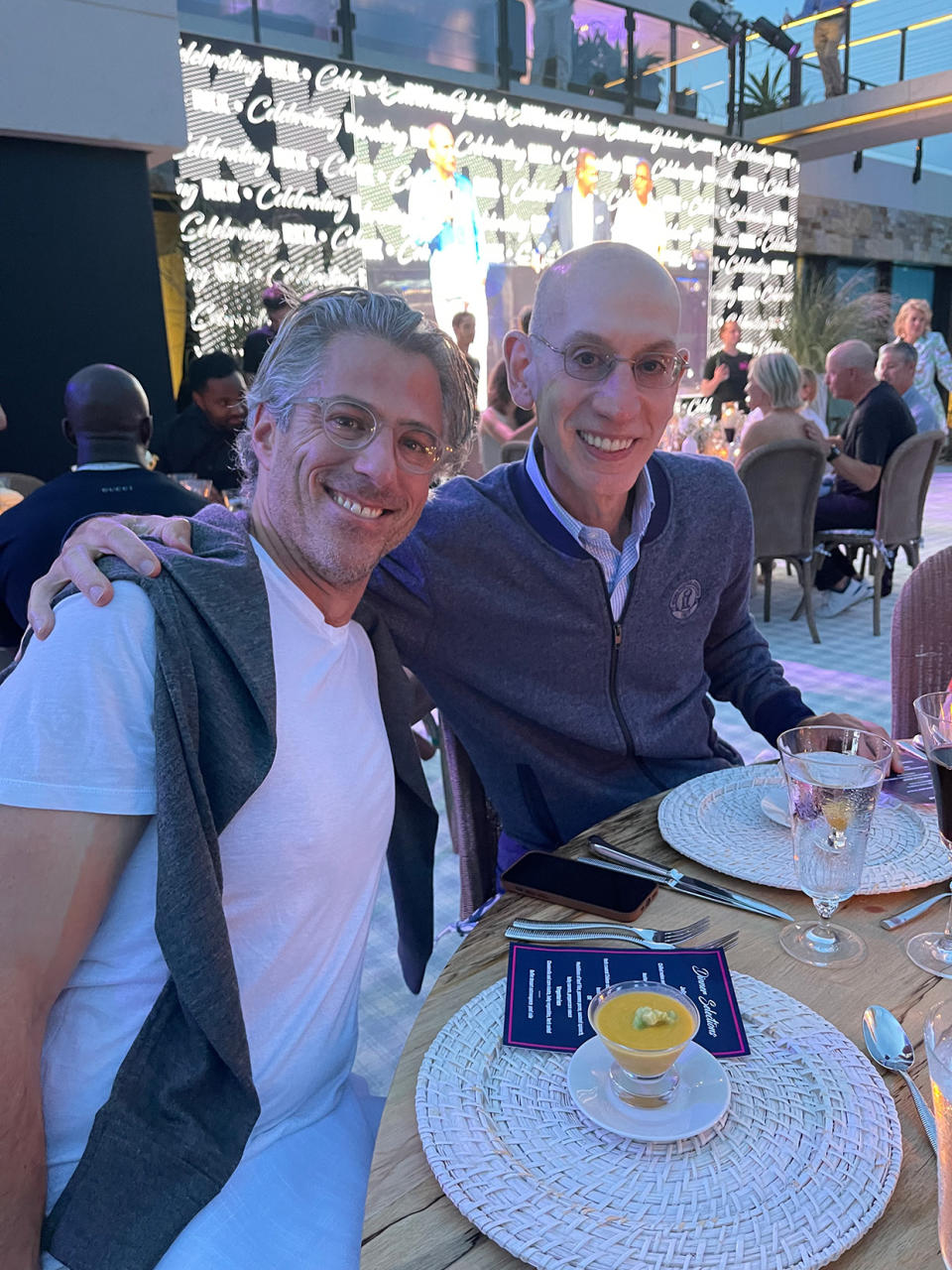 Casey Wasserman (left) with NBA commissioner Adam Silver at New England Patriots owner Robert Kraft’s birthday party in 2021.