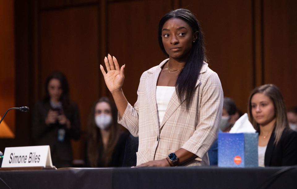 US Olympic gymnasts Simone Biles is sworn in to testify during a Senate Judiciary hearing about the Inspector General's report on the FBI handling of the Larry Nassar investigation of sexual abuse of Olympic gymnasts, on Capitol Hill, September 15, 2021, in Washington, DC. (Photo by SAUL LOEB / POOL / AFP) (Photo by SAUL LOEB/POOL/AFP via Getty Images)