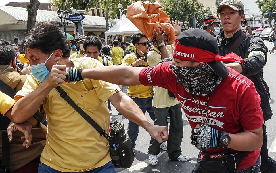 Minor scuffles have broken out between democracy protesters and royalists - Rugroj Yongrit/EPA-EFE/Shutterstock