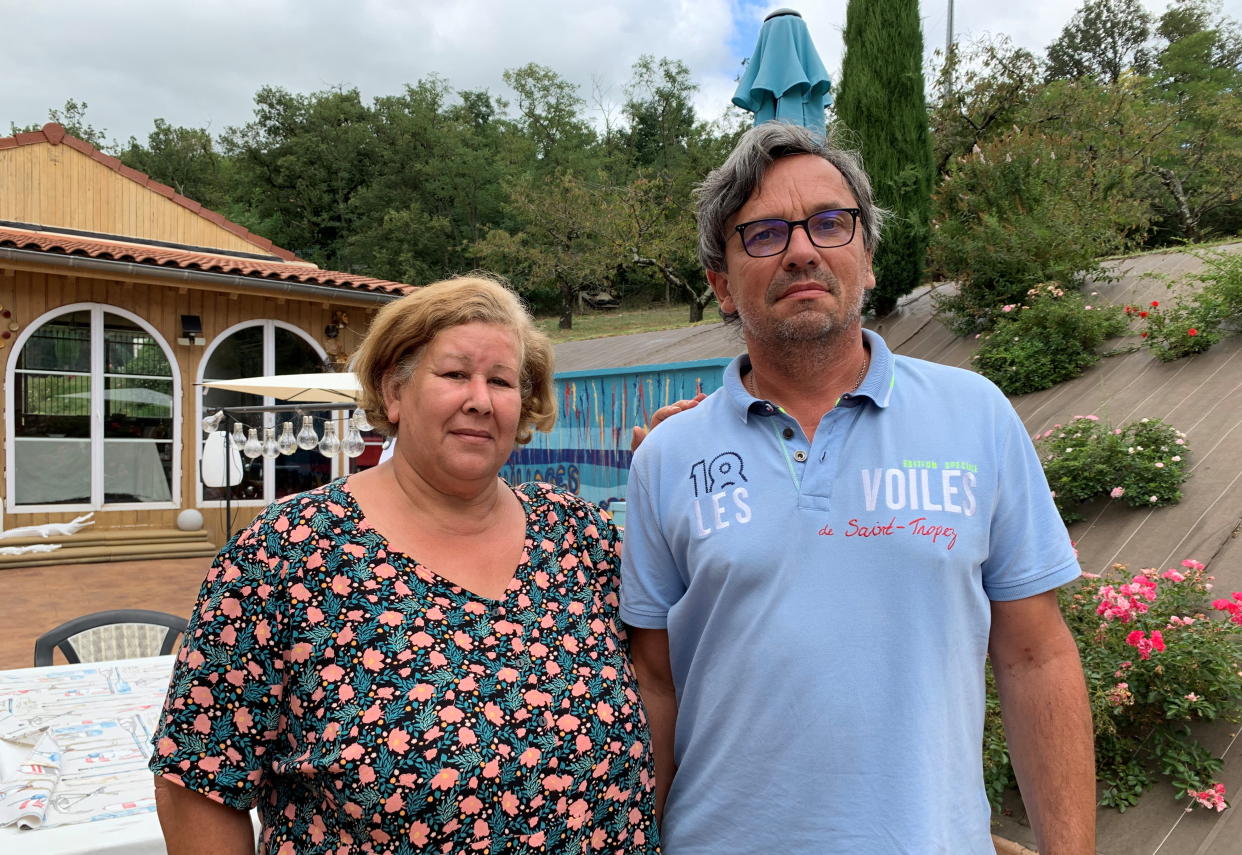 Jeanne Pouchain poses with her husband Pierre-Jean Pouchain during an interview with Reuters at her home, detailing the ordeal she has been living through since being declared dead by a judge, in Saint-Joseph, near Lyon, August 30, 2021. Picture taken August 30, 2021. REUTERS/Cecile Mantovani