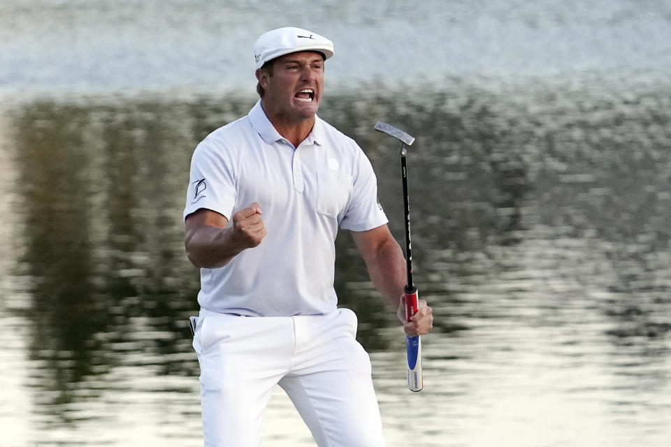 Bryson DeChambeau celebrates after sinking a putt to win the Arnold Palmer Invitational golf tournament Sunday, March 7, 2021, in Orlando, Fla. (AP Photo/John Raoux)