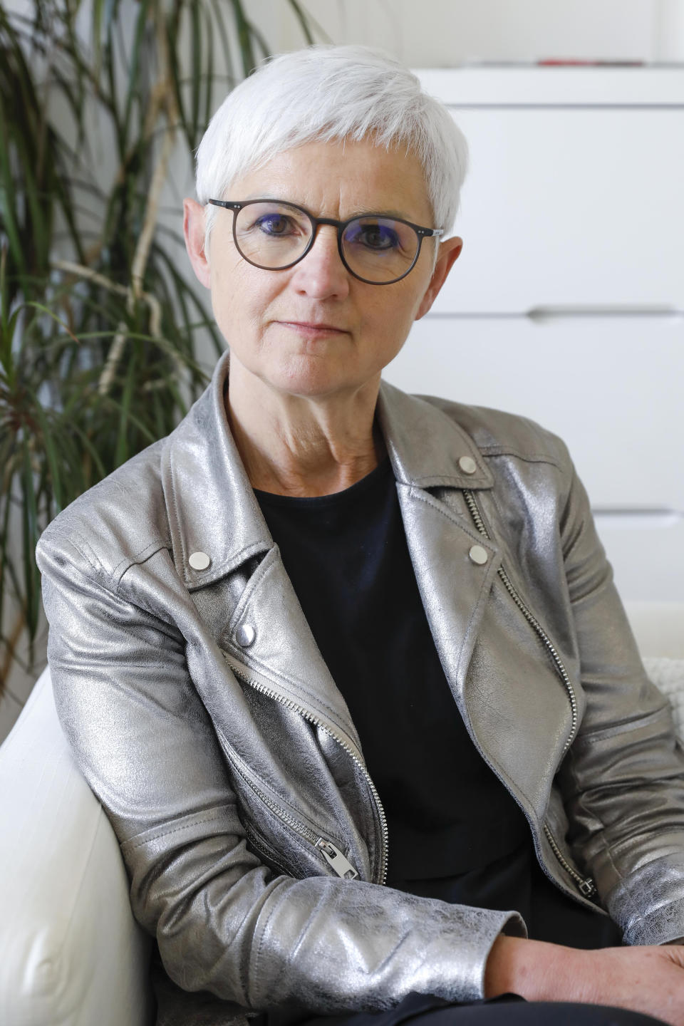 Maria Roesslhumer, who is the head of Austria's biggest network of women's shelters, poses for a portrait in Vienna, Austria, Thursday, May 20, 2021. Austria is one of the few European Union countries where the number of women killed is higher than the number of men. The recent high-profile cases have led to widespread protests, demands for government intervention and condemnations from top politicians. (AP Photo/Lisa Leutner)